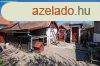 Elad csaldi hz Komdi kzpont